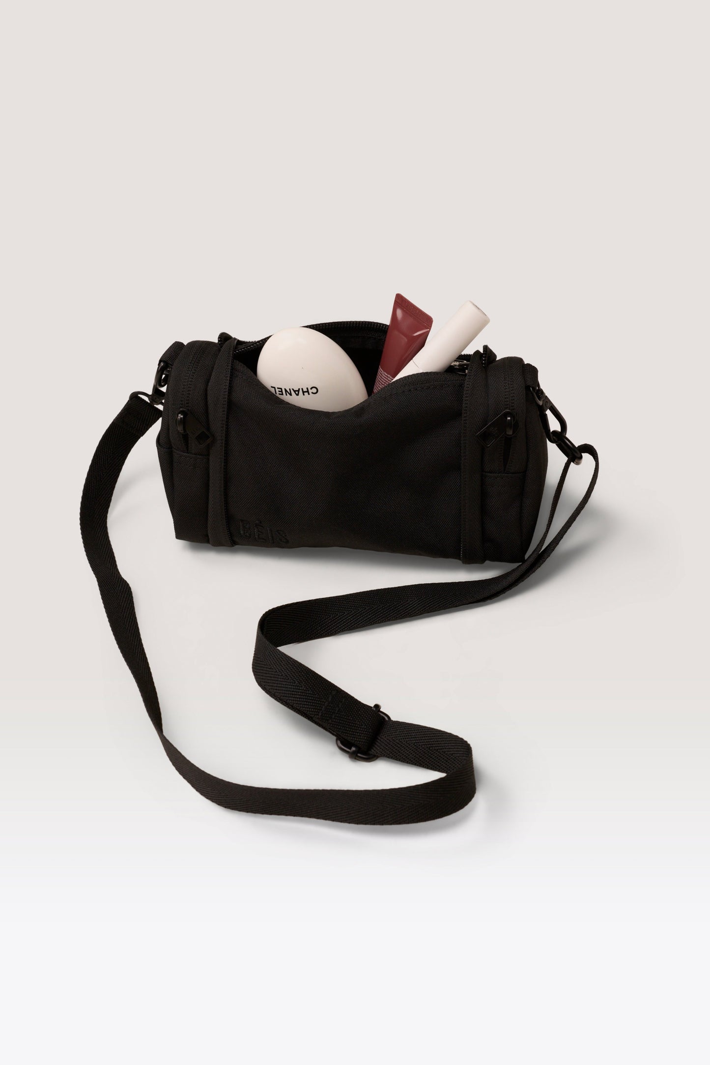 The Expandable Crossbody Charm in Black