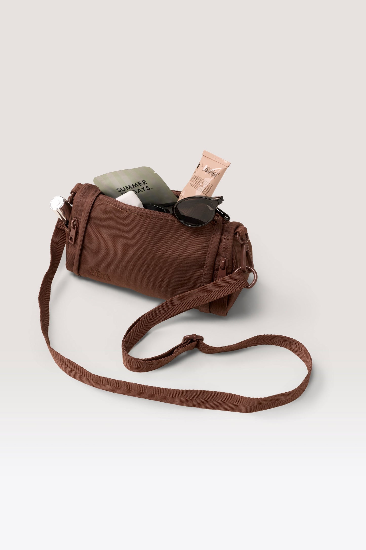 The Expandable Crossbody Charm in Maple