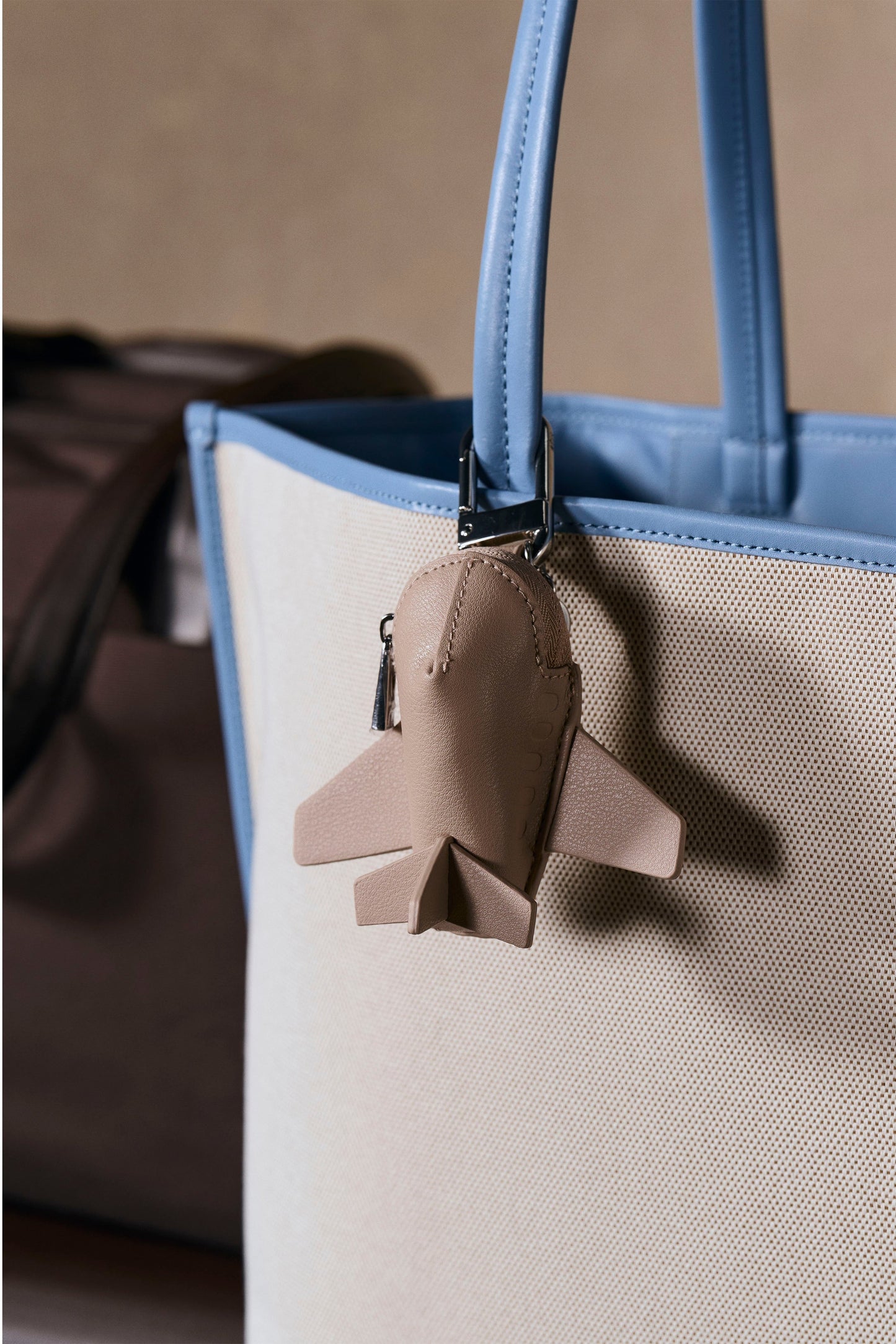 The Airplane Charm in Beige
