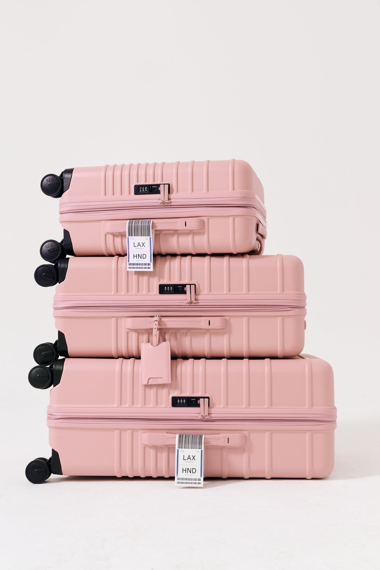 The Large Check-In Roller in Atlas Pink
